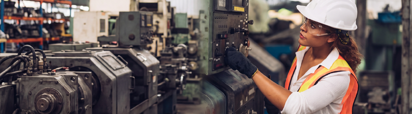 Factory worker in safety equipment